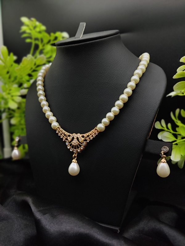 Imported Regal Pearl Embrace Necklace Set With Elegant Drop Design